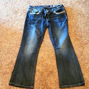 EUC Distressed Miss Me Jeans Size 34 Length 31. Mid Rise Easy Boot